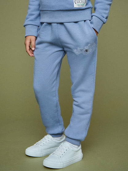 Reiss 13-14 yrs SmileyWorld Cuffed Joggers Unisex Fit in Blue